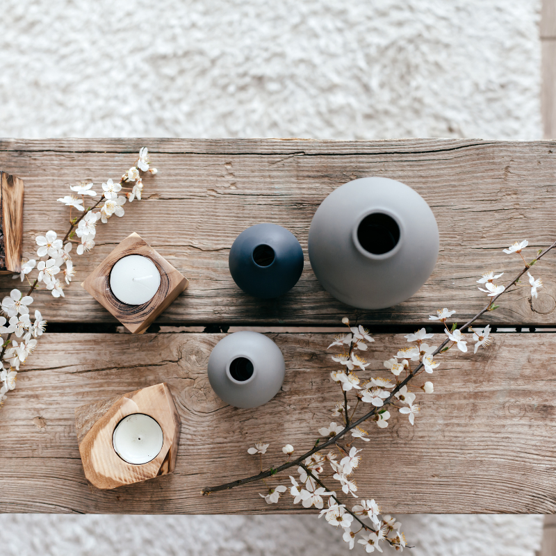 vase and candle with zen arrangement.